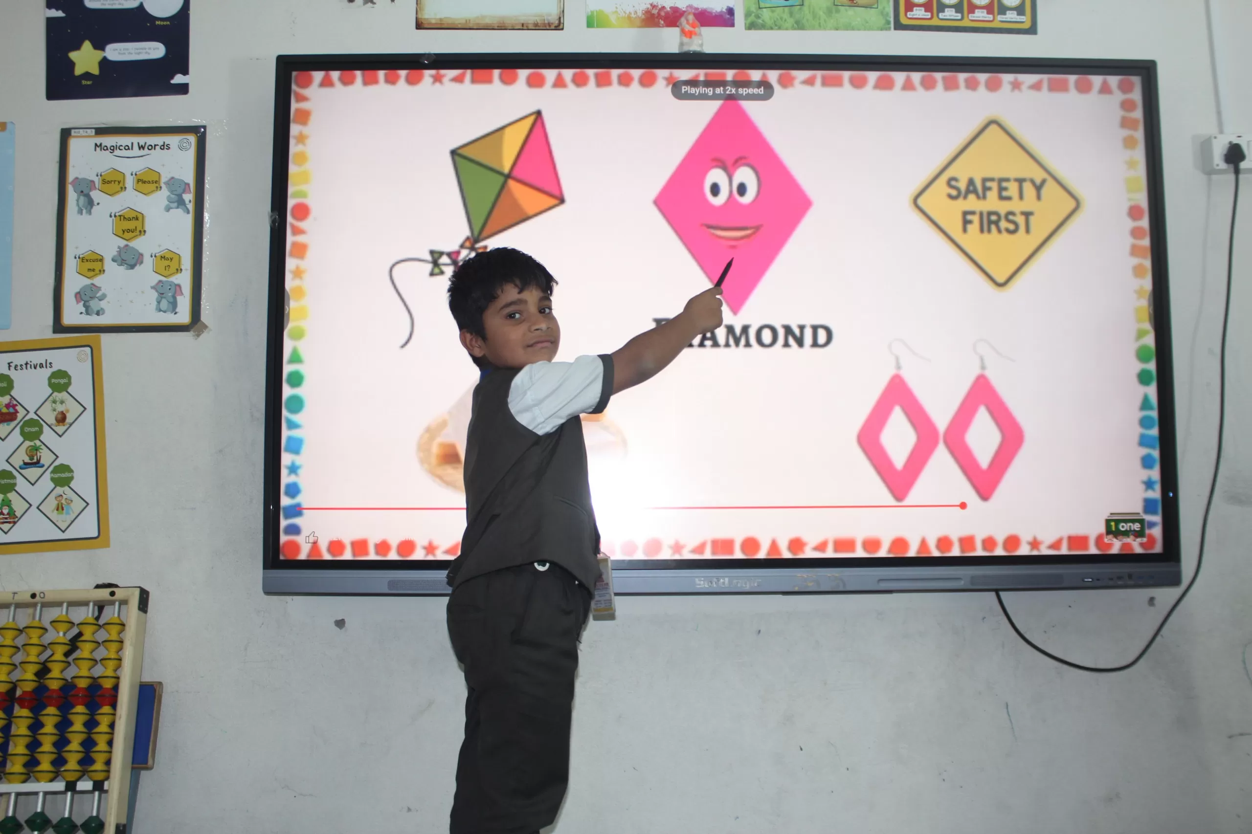 Queens Global School students celebrating academic success, representing the best Schools in Ranganagar.